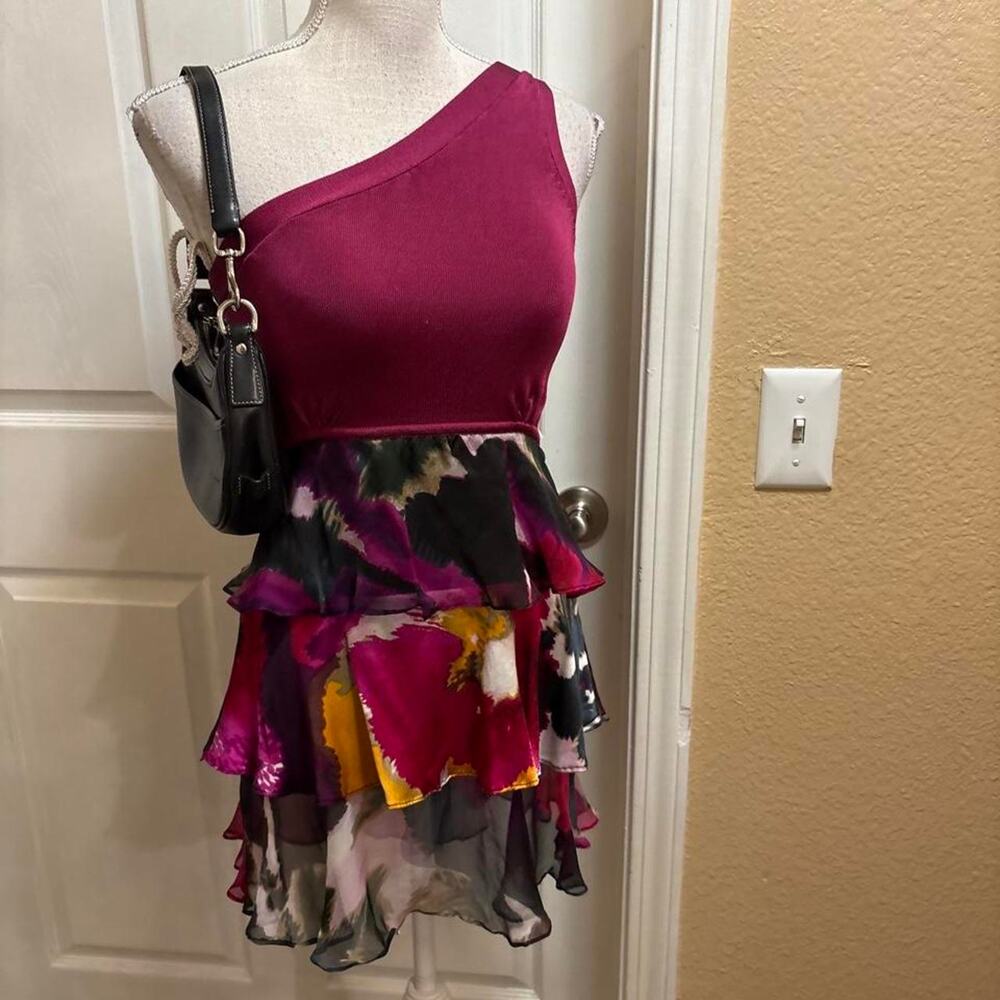 Bebe one shoulder top with silk ruffle bottom. Size small